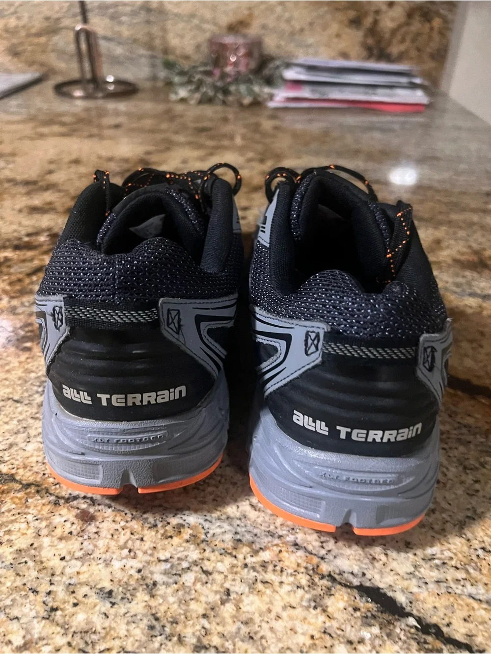 New Balance Men’s Black and Gray Athletic Trail Shoes with Orange Accents